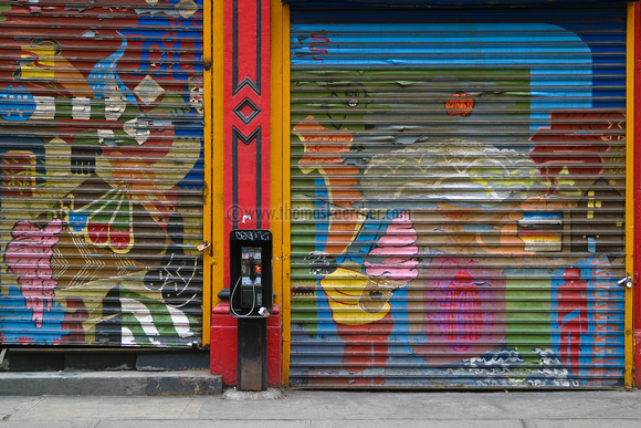 colsed shop with graffiti